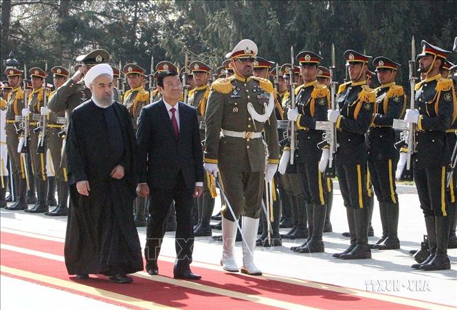 Tổng thống Iran Hassan Rouhani chủ trì Lễ đón Chủ tịch nước Trương Tấn Sang thăm cấp Nhà nước Cộng hòa Hồi giáo Iran (Tehran, 14/3/2016). Ảnh: Nguyễn Khang – TTXVN
 