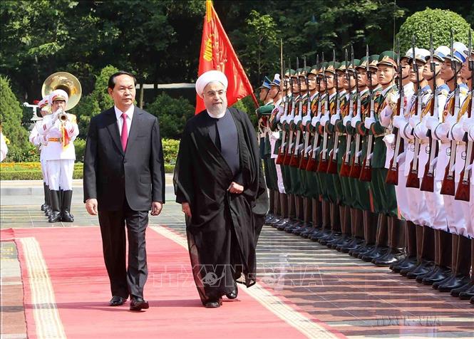 Chủ tịch nước Trần Đại Quang chủ trì Lễ đón Tổng thống Cộng hòa Hồi giáo Iran Hassan Rouhani thăm cấp Nhà nước tới Việt Nam (Hà Nội, 6/10/2016). Ảnh: Nhan Sáng – TTXVN
 