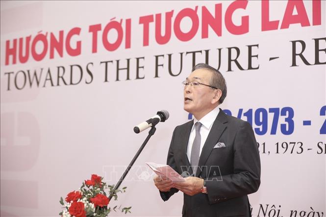 Kyodo President Mizutani Toru speaks at the exhibition’s opening ceremony. VNA Photo: Minh Quyết 