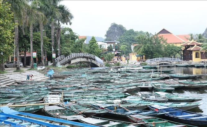 Những con đò mòn mỏi chờ khách. Ảnh: Đức Phương – TTXVN