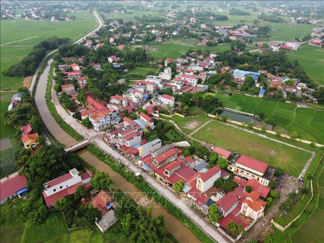 Diện mạo khang trang của khu dân cư nông thôn xã Lương Phú, huyện Phú Bình. Huyện Phú Bình đạt chuẩn NTM năm 2022. Ảnh: Vũ Sinh - TTXVN