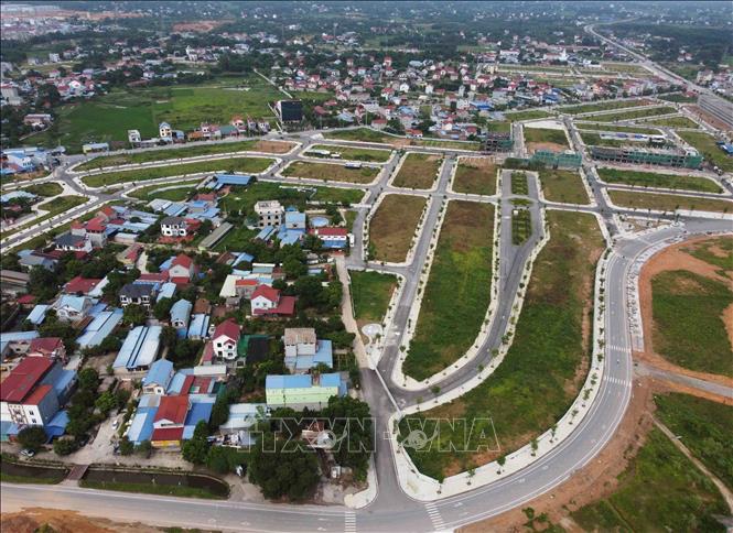 Khu dân cư ở thị trấn Phú Bình được quy hoạch theo tiêu chí NTM. Huyện Phú Bình đạt chuẩn NTM năm 2022. Ảnh: Vũ Sinh - TTXVN