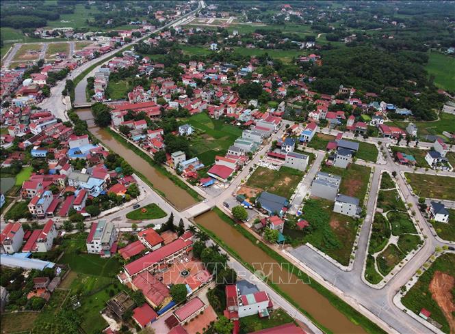 Diện mạo khang trang của khu dân cư nông thôn xã Lương Phú, huyện Phú Bình. Huyện Phú Bình đạt chuẩn NTM năm 2022. Ảnh: Vũ Sinh - TTXVN