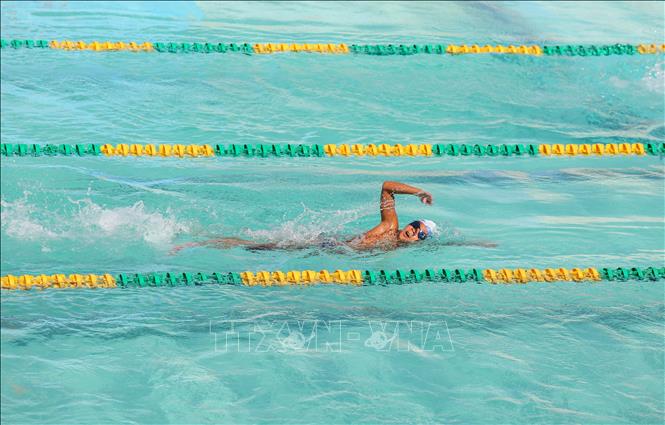 Vận động viên tranh tài nội dung bơi tại hồ bơi Hải Đăng, tỉnh Tây Ninh. Ảnh: Giang Phương - TTXVN