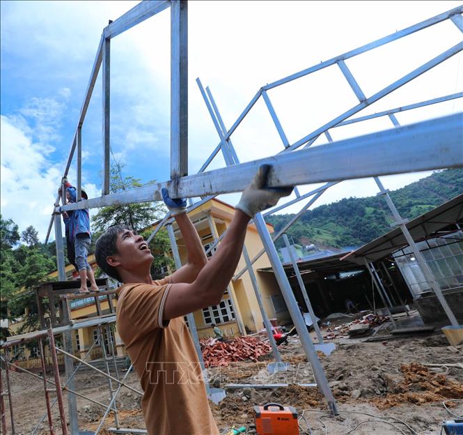 Những phòng học mới đang được xây dựng tại trường phổ thông dân tộc bán trú TH và THCS Hồ Bốn (Mù Cang Chải, Yên Bái). Ảnh: Thanh Tùng - TTXVN