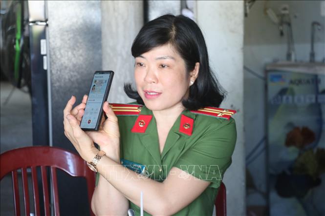 Chân dung Trung tá Lê Thị Thùy Dung, trưởng công an xã Đại Điền, huyện Thạnh Phú. Ảnh: Huỳnh Phúc Hậu - TTXVN