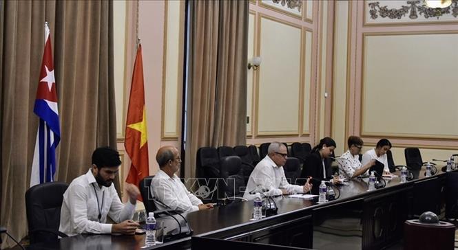 Tổng Thư ký Quốc hội và Hội đồng Nhà nước Cuba Homero Acosta Álvarez tại buổi tiếp đồng chí Nguyễn Trọng Nghĩa, Bí thư Trung ương Đảng, Trưởng Ban Tuyên giáo Trung ương, và đoàn công tác.  Ảnh: Mai Phương-Pv TTXVN tại Cuba
