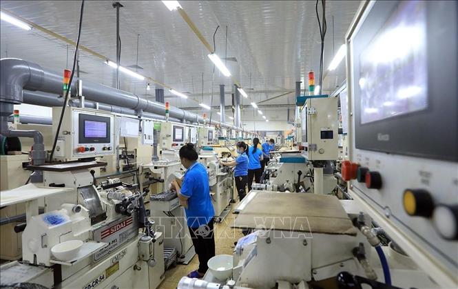 Production at the Japanese-invested R Technical Research Vietnam Co. Ltd. in the northern province of Hoa Binh. VNA Photo: Tuấn Anh 