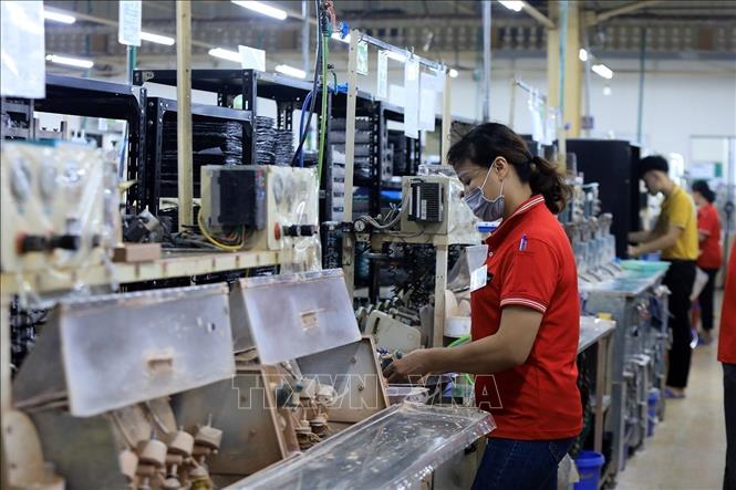 Production at the Japanese-invested R Technical Research Vietnam Co. Ltd. in the northern province of Hoa Binh. VNA Photo: Tuấn Anh 