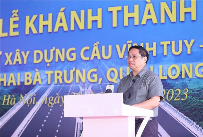 Thủ tướng Phạm Minh Chính phát biểu tại Lễ khánh thành cầu Vĩnh Tuy - giai đoạn 2. Ảnh: Dương Giang - TTXVN
