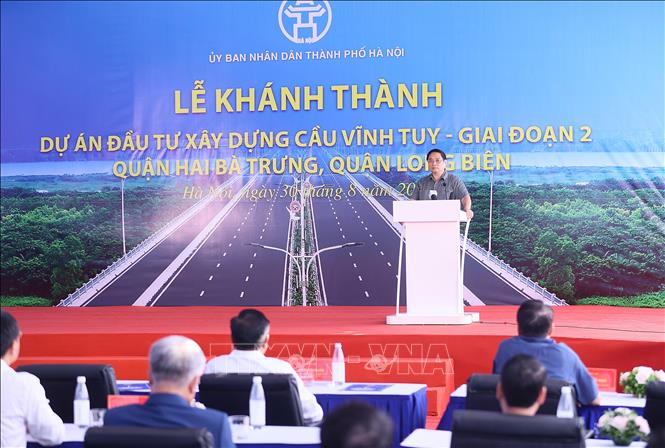 Thủ tướng Phạm Minh Chính phát biểu tại Lễ khánh thành cầu Vĩnh Tuy - giai đoạn 2. Ảnh: Dương Giang - TTXVN
