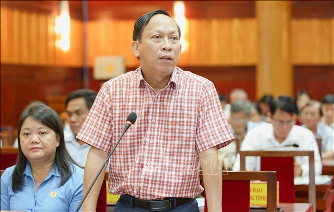 Ông Nguyễn Đình Xuân, Giám đốc Sở Nông nghiệp và Phát triển nông thôn tỉnh Tây Ninh trả lời kiến nghị của các doanh nghiệp. Ảnh: Giang Phương - TTXVN