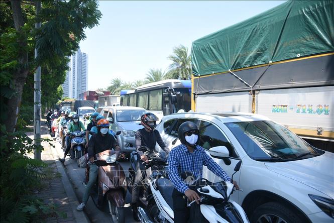Ùn tắc giao thông trên đường Giải Phóng hướng ra Quốc lộ 1. Ảnh: TTXVN
