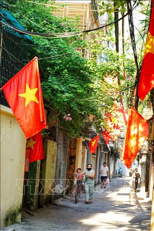 Sáng mùng 2 tháng 9 yên bình trong ngõ Bùi Ngọc Dương, quận Hai Bà Trưng. Ảnh: Khánh Hoà - TTXVN
