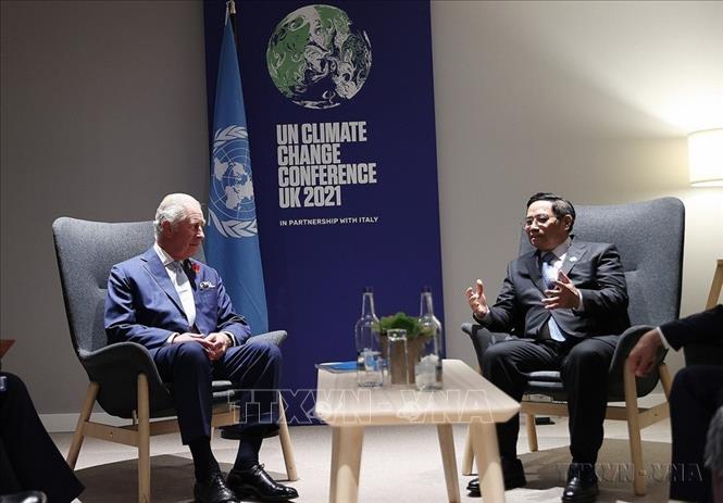 Bên lề Hội nghị COP26, chiều 2/11/2021, tại Glasgow, Scotland (Vương Quốc Anh), Thủ tướng Phạm Minh Chính gặp Thái tử Vương Quốc Anh Charles Philip Arthur George. Ảnh: Dương Giang-TTXVN