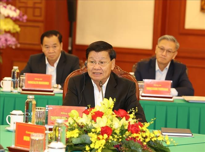 General Secretary of the Lao People’s Revolutionary Party and President of Laos Thongloun Sisoulith at the meeting. VNA Photo: Trí Dũng 
