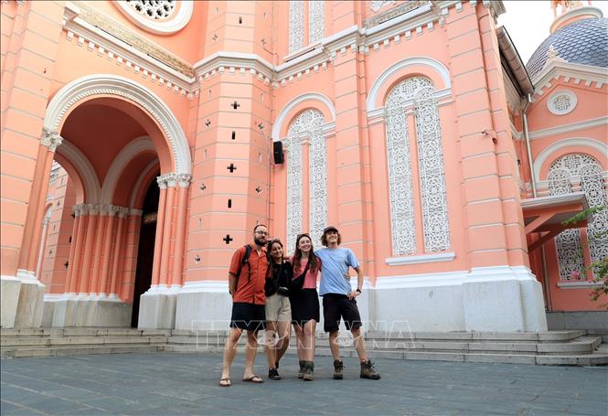 Foreign tourists at Tan Dinh church. VNA Photo: Hồng Đạt