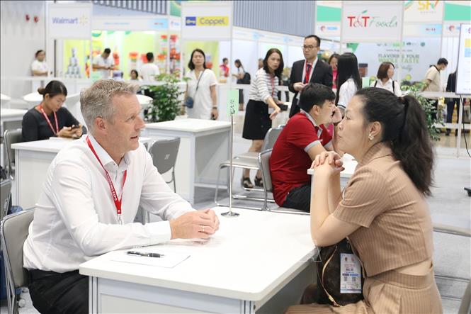 The events serve as a platform for businesses to share experience and to participate in cooperation opportunities. VNA Photo: Thanh Vũ