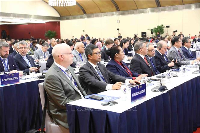 Delegates attend the opening ceremony. VNA Photo