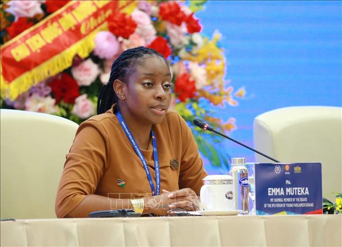 Emma Tangi Muteka, Member of Parliament from Namibia and Member of the Leadership Committee of the IPU Young Parliamentarians Forum, presides the opening ceremony. VNA Photo