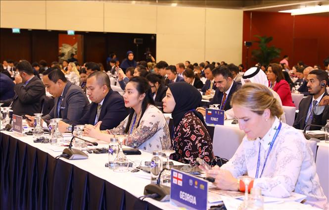 Delegates attend the closing ceremony. VNA Photo