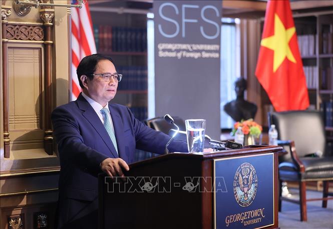 PM Pham Minh Chinh speaks at Georgetown University. VNA Photo: Dương Giang