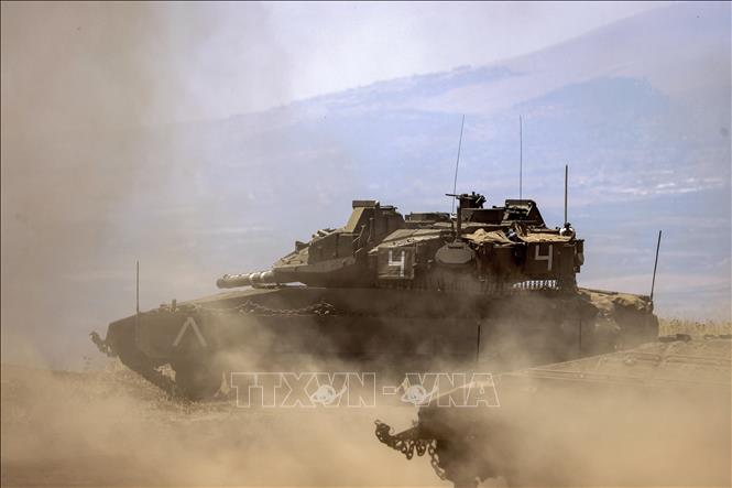 (Tư liệu) Xe tăng chiến đấu Merkava của Israel tham gia cuộc tập trận trên Cao nguyên Golan, ngày 22/6/2023. Ảnh: AFP/TTXVN