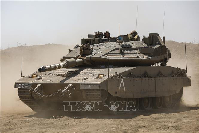 (Tư liệu) Xe tăng chiến đấu Merkava của Israel tham gia cuộc tập trận ở Cao nguyên Golan ngày 22/6/2023. Ảnh: AFP/TTXVN