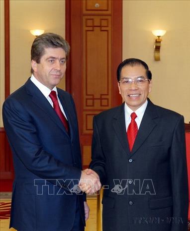 Tổng Bí thư Nông Đức Mạnh tiếp Tổng thống Bulgaria Georgi Parvanov thăm chính thức Việt Nam (Hà Nội, 31/1/2009). Ảnh: Nhan Sáng – TTXVN