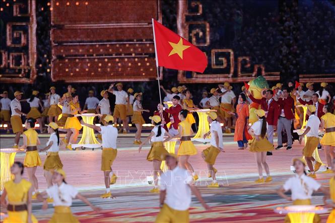 Đoàn Thể thao Việt Nam diễu hành tại Lễ khai mạc ASIAD 19. Ảnh: Hoàng Linh – TTXVN
