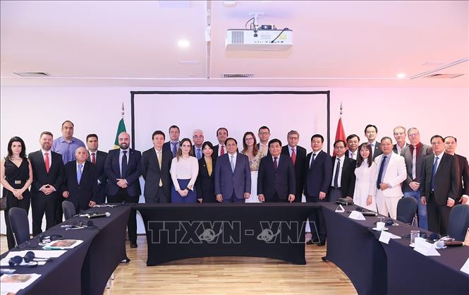 Thủ tướng Phạm Minh Chính với đại diện các doanh nghiệp Brazil. Ảnh: Dương Giang-TTXVN
