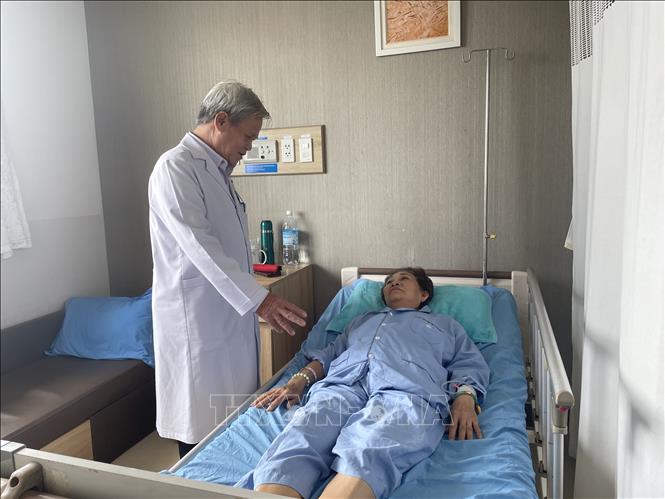 Bệnh nhân N.T.Đ có 2 khối u nghi ác tính đang được theo dõi sức khoẻ tại Bệnh viện đa khoa Đồng Nai 2. Ảnh: Lê Xuân-TTXVN