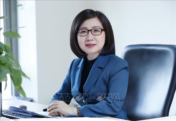 Phó Tổng Giám đốc TTXVN Đoàn Thị Tuyết Nhung trả lời phỏng vấn báo chí. Ảnh: Văn Điệp-TTXVN