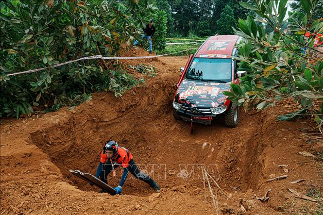 Đội 210 tranh tài tại đường đua số 9. Ảnh: Phạm Tuấn Anh - TTXVN