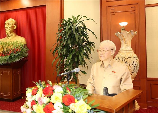 Tổng Bí thư Nguyễn Phú Trọng nói chuyện với các đại biểu dự buổi gặp mặt. Ảnh: Trí Dũng –TTXVN