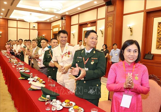 Các đại biểu điển hình tiêu biểu toàn quốc dự buổi gặp mặt. Ảnh: Trí Dũng –TTXVN