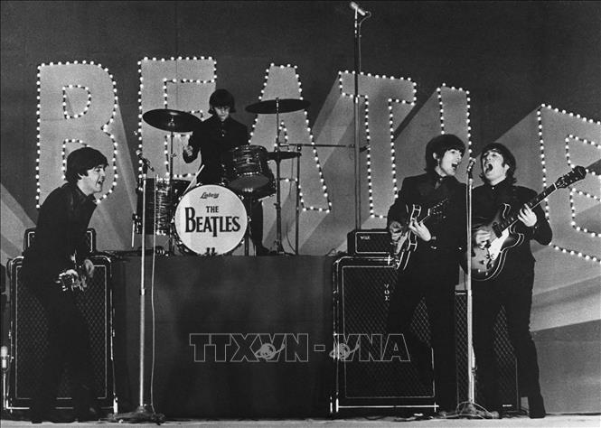 (Tư liệu) Các thành viên ban nhạc The Beatles biểu diễn tại Tokyo, Nhật Bản, ngày 30/6/1966. Ảnh: AFP/TTXVN