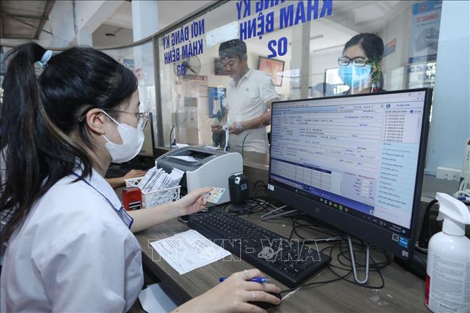 Người bệnh đến khám, chữa bệnh bằng căn cước công dân tại Trung tâm Y tế huyện Hữu Lũng (Lạng Sơn). Ảnh: Anh Tuấn – TTXVN