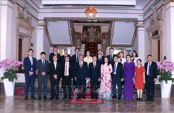 Các đại biểu chụp ảnh lưu niệm tại buổi tiếp. Ảnh: Xuân Khu-TTXVN