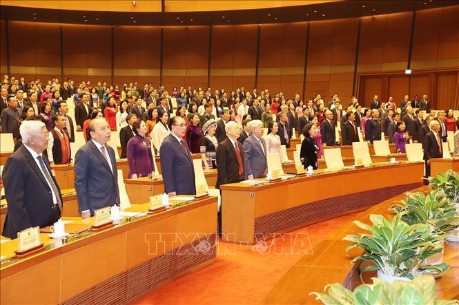 Tổng Bí thư Nguyễn Phú Trọng cùng các đồng chí lãnh đạo, nguyên lãnh đạo Đảng, Nhà nước và đại biểu Quốc hội thực hiện nghi lễ chào cờ, bế mạc Kỳ họp thứ 6, Quốc hội khóa XV. Ảnh: Trí Dũng – TTXVN
