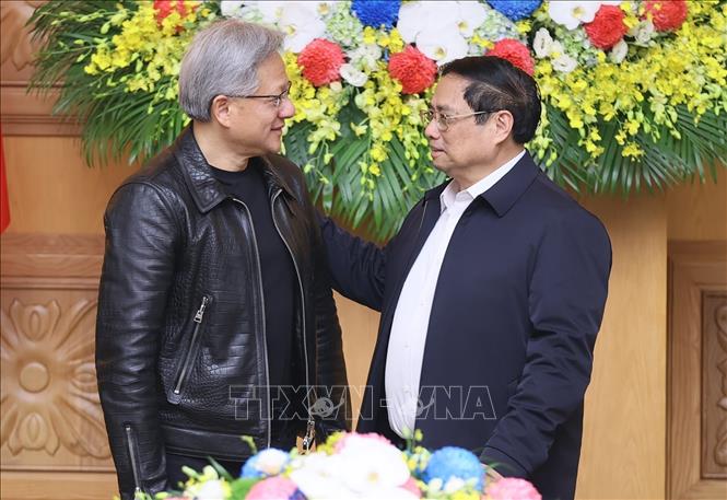 Thủ tướng Phạm Minh Chính tiếp ông Jensen Huang Chủ tịch kiêm Giám đốc điều hành Tập đoàn NVIDIA. Ảnh: Dương Giang-TTXVN
