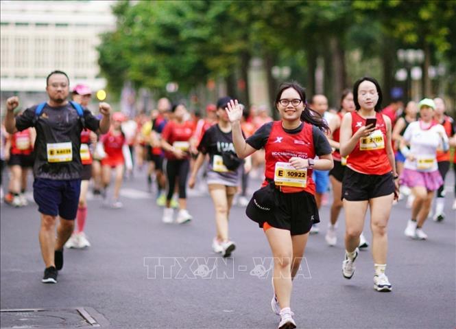More than 30,000 runners from 91 countries and territories participate in Techcombank International Marathon in Ho Chi Minh City on December 10. VNA Photo: Mỹ Phương