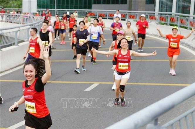 More than 30,000 runners from 91 countries and territories participate in Techcombank International Marathon in Ho Chi Minh City on December 10. VNA Photo: Mỹ Phương