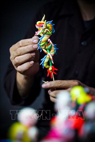 Each to he figurine carries an essence of its craftsman. VNA Photo: Khánh Hòa