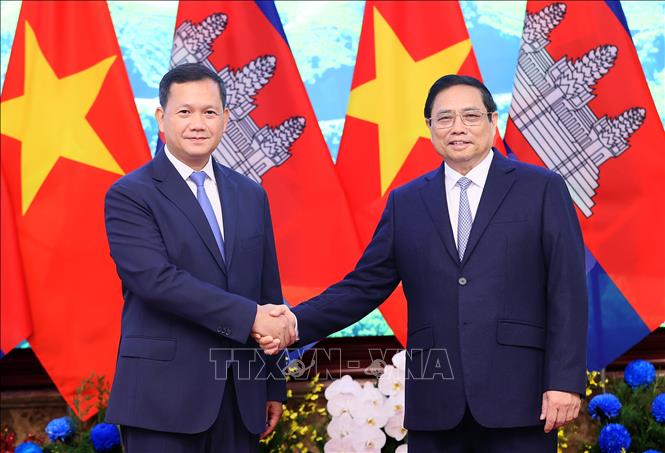 Thủ tướng Phạm Minh Chính và Thủ tướng Campuchia Samdech Hun Manet. Ảnh: Dương Giang-TTXVN
