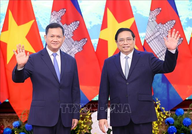 Thủ tướng Phạm Minh Chính và Thủ tướng Campuchia Samdech Hun Manet. Ảnh: Dương Giang-TTXVN
