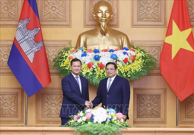 Thủ tướng Phạm Minh Chính và Thủ tướng Campuchia Samdech Hun Manet. Ảnh: Dương Giang-TTXVN