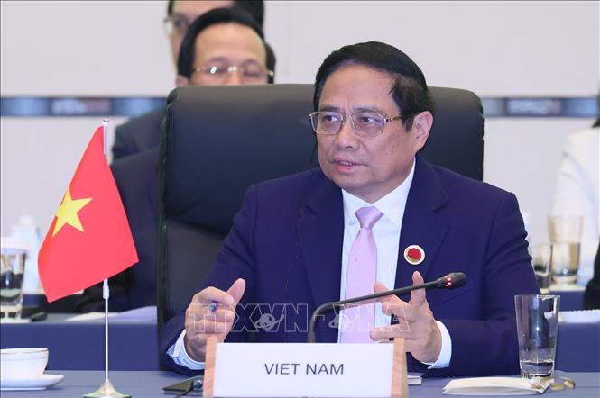 Prime Minister Pham Minh Chinh speaks at the Commemorative Summit for the 50th Year of ASEAN-Japan Friendship and Cooperation. VNA Photo: Dương Giang