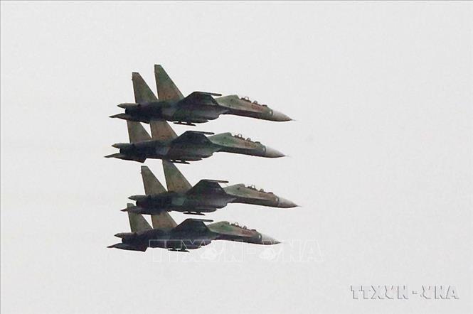 Tốp máy bay Su-30MK2 (Trung đoàn Không quân 927) trình diễn phục vụ Triển lãm Quốc phòng quốc tế 2022. Ảnh: Trọng Đức - TTXVN