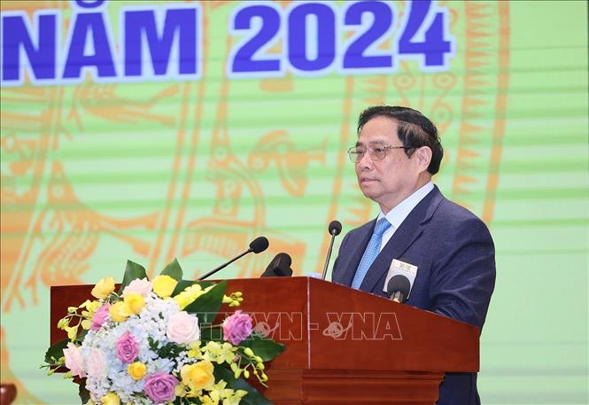 Prime Minister Pham Minh Chinh speaks at the conference. VNA Photo: Dương Giang